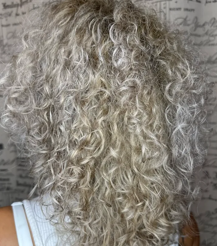 Pearly white snow curls — hair work by Stephanie Thomas at Gypsy Cosmo Salon