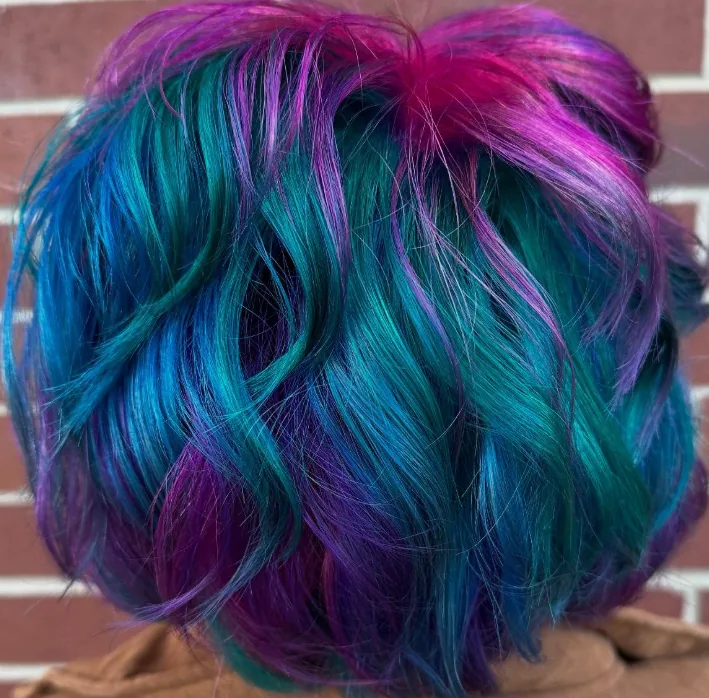 holiday peacock — hair work by Stephanie Thomas at Gypsy Cosmo Salon